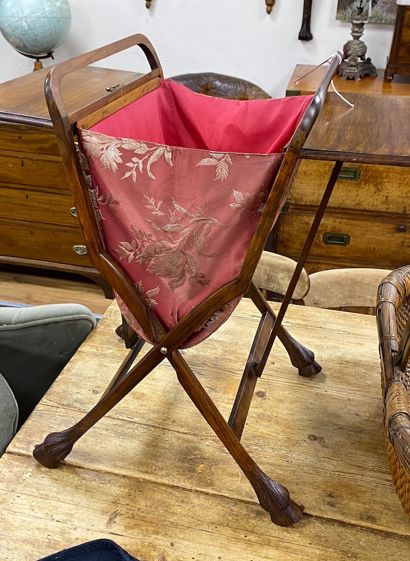 An early 20th century mahogany sewing basket, width 62cm, depth 35cm, height 61cm